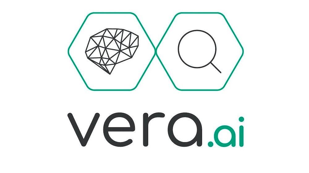 The project's official logo: Two adjacent hexagons in green show an abstract representation of a neural network (left side) and a magnifying glass (right side). Below, small letters spell out: vera dot ai, also in black (vera) and green (ai).
